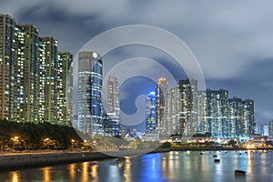 High rise residential building in Hong Kong city at night