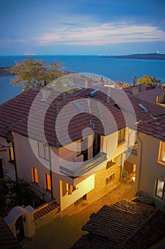 Seaside houses in Sozopol, Bulgaria, at night photo