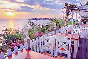 Seaside landscape - the cafe on the embankment view of the Old Town of Nesebar