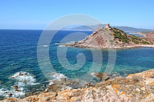 Seaside landscape and medieval watchtower