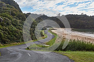Seaside landscape with road in Stewart Island, New Zealand