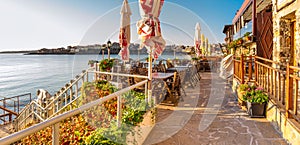 Seaside landscape - view from the cafe on the embankment in the town of Sozopol