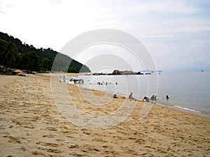 A seaside of pangkor island with yellowish sand , Malaysia