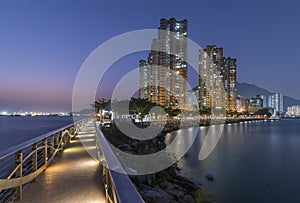 Seaside promenade and high rise residential building