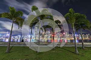 Seaside promenade of Victoria harbor of Hong Kong city at night