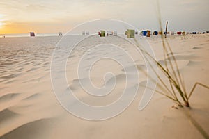 Seaside resort.sandy beaches and Beach cabins on white sand.Sea vacation.Beach summer mood.Vacation on the North Sea