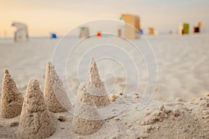 Seaside resort.White sandy beaches and Beach cabins on white sand.Beach summer mood.Vacation on the North Sea. Beaches
