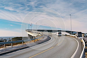 Seaside road bend with blue sky