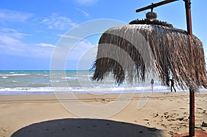 Seaside in the summer near to beach with sun visors