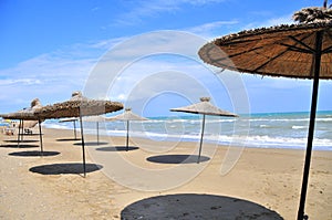 Seaside in the summer near to beach with sun visors