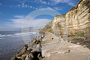 Seaside tetrapots and cliff