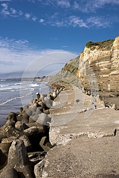 Seaside tetrapots and cliff