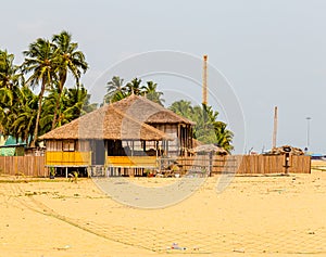 Seaside thatched huts on Awolowo beach Lekki Lagos Nigeria photo