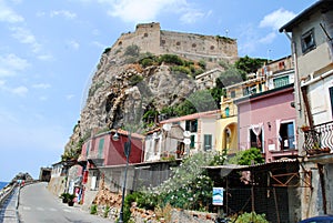Seaside town Scilla with old medieval castle on rock Castello Ruffo. Scilla, Calabria, Italy. July 2019