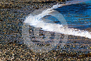 Seaside and waves, beach with sand, water, shell