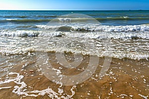 Seaside and waves, beach with sand, water, shell