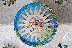 Season mosaic at sala Hipostila in Park Guell photo