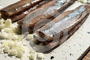 Season of new Dutch herring fresh salted fish ready to eat, traditional food in Netherlands