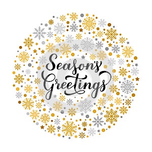 SeasonÃ¢â¬â¢s Greetings calligraphy hand lettering with gold and silver snowflakes, stars and dots. Christmas and New Year typography