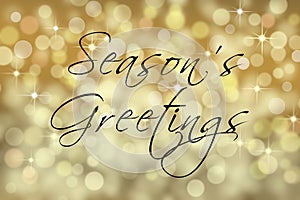 Seasons Greetings text card with bokeh background. photo