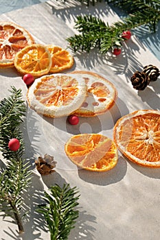 Seasonal Citrus with Pinecones and Berries