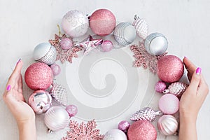 Seasonal decor christmas background hands wreath