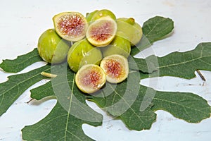 Seasonal fruits white Sardinian figs on a vintage board photo