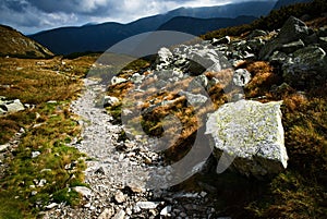 Stone walkway into the valley in the mountains