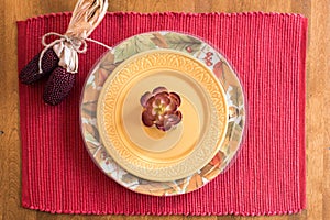 Seasonal placesetting with fall dishes
