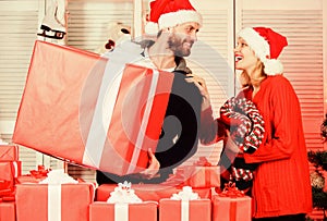 Seasonal sale. Guy with big gift box. Spread happiness. Big surprise for her. Preparing presents for christmas. New year