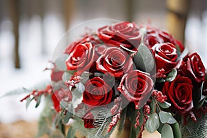 Seasonal sophistication Red roses embellish the winter wedding decor elegantly