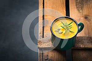 Seasonal spicy fall autumn creamy pumpkin and carrot soup