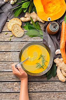 Seasonal spicy fall autumn creamy pumpkin and carrot soup