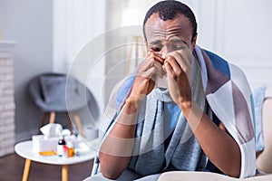 Unhappy adult man being ill