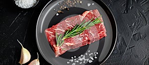 Seasoned Black Angus Striploin Steak on Plate