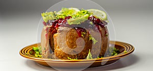 Seasoned British pork, wrapped in crisp, flavoursome pastry served with  beetroot and orange chutney on top