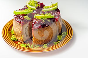 Seasoned British pork, wrapped in crisp, flavoursome pastry served with  beetroot and orange chutney on top