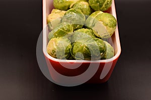 Seasoned Brussel Sprouts on a Black Background