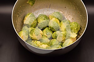 Seasoned Brussel Sprouts on a Black Background