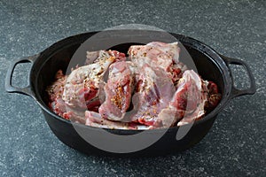 Seasoned lamb meat ready to roast, side view