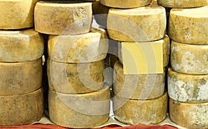 Seasoned round cheeses for sale