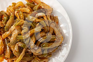 Seasoned zhacai pickles on white background