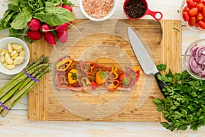 Seasoning top loin, New York strip with veggies