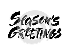 Seasons greetings calligraphy lettering text on white background with vintage paper texture. Retro greeting card for