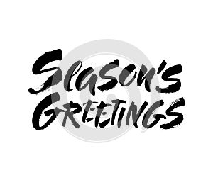 Seasons greetings calligraphy lettering text on white background with vintage paper texture. Retro greeting card for Christmas and