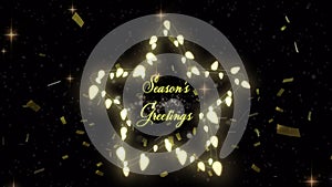 Seasons Greetings text on glowing fairy lights forming a star on black background