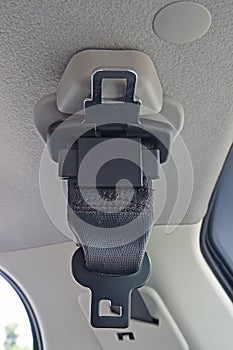 A seat belt and buckle for rear back passengers