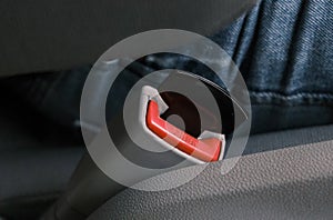 Seat belt buckle. Security system in the car. Plug for deceiving machine automation. photo