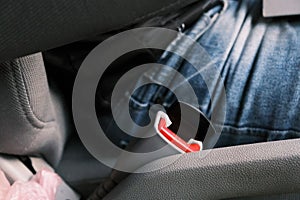 Seat belt buckle. Security system in the car. Plug for deceiving machine automation. photo