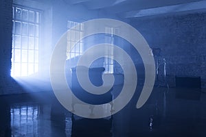 A seat in a blue backlight in studio photo